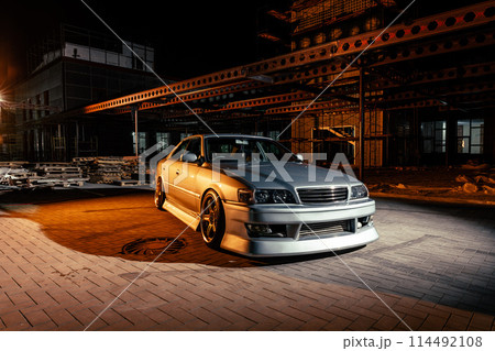 Silver Car Parked in Front of Building 114492108