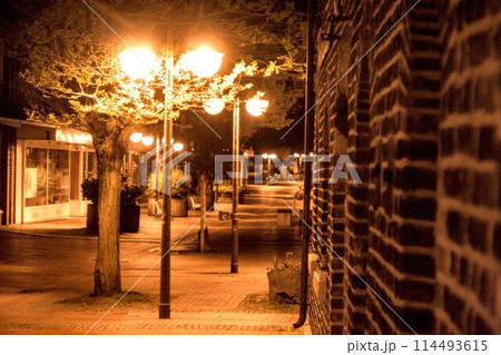 light iron lantern in the street at night light iron lantern in the street at night 114493615