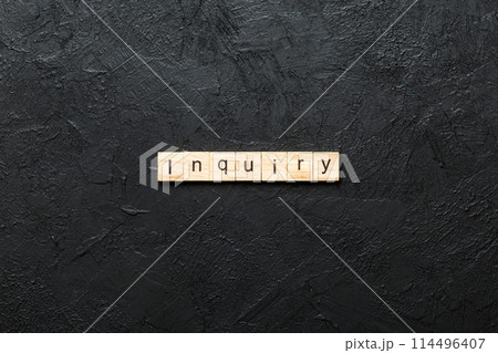 inquiry word written on wood block. inquiry text on table, concept 114496407