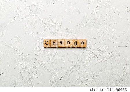 CHANGE word written on wood block. CHANGE text on cement table for your desing, concept CHANGE word written on wood block. CHANGE text on cement table for your desing, concept 114496428