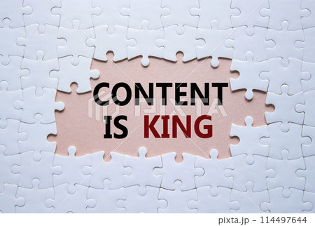 Content is king symbol. Concept words Content is king on white puzzle. Beautiful pink background. Business and Content is king concept. Copy space. 114497644