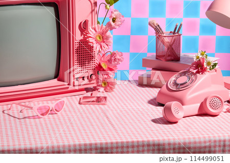 Various pink items placed on pink plaid table against colorful background, decorated by flor gerbera daisy. Photo for advertise product which has organic ingredient, empty space for displaying Various pink items placed on pink plaid table against colorful background, decorated by flor gerbera daisy. Photo for advertise product which has organic ingredient, empty space for displaying 114499051