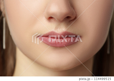 Part of face, young woman lips close up Part of face, young woman lips close up 114499515