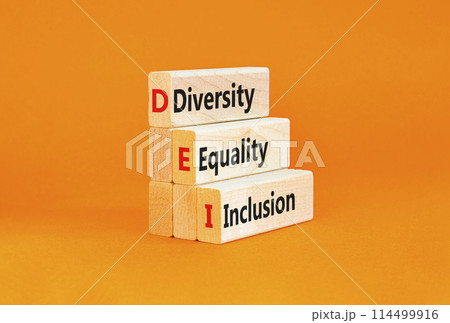 DEI diversity equality inclusion symbol. Concept words DEI diversity equality inclusion on blocks. Beautiful orange background. Business DEI diversity equality inclusion concept. Copy space. 114499916
