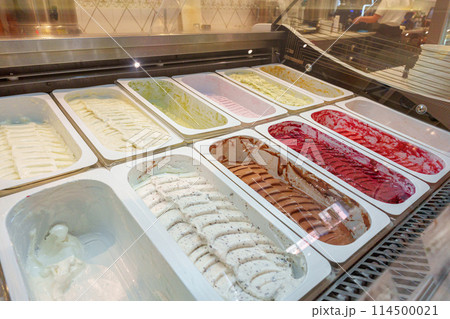 Colorful Assortment of Gelato Flavors in a Display Case at an Italian Ice Cream Shop Colorful Assortment of Gelato Flavors in a Display Case at an Italian Ice Cream Shop 114500021