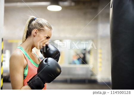 Beautiful sport woman doing box as cardiovascular training. Routine workout for woman's physical and mental health. Beautiful sport woman doing box as cardiovascular training. Routine workout for woman's physical and mental health. 114500128