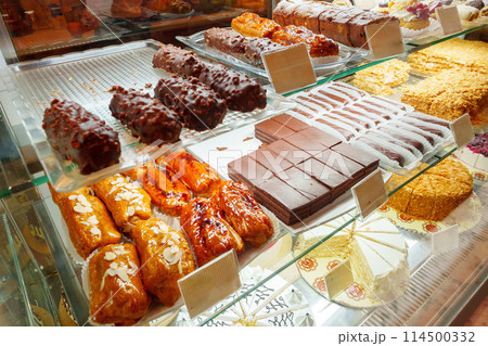 Delectable Assortment of Pastries and Sweets on Display at a Bakery Shop 114500332