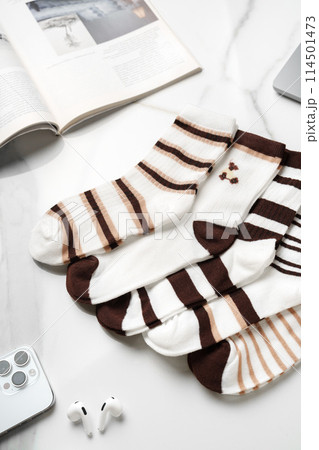 Composition with stylish socks on white background Composition with stylish socks on white background 114501473