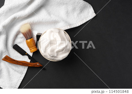 Traditional Wet Shaving Gear Arranged on a Dark Background With Morning Light Traditional Wet Shaving Gear Arranged on a Dark Background With Morning Light 114501848