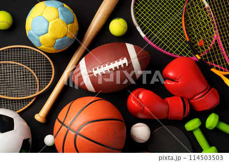 Various sports equipment on black background studio shot Various sports equipment on black background studio shot 114503503