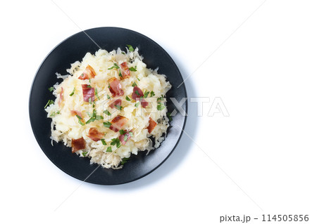 Slovak potato dumplings halusky with steamed sauerkraut and bacon isolated on white background Slovak potato dumplings halusky with steamed sauerkraut and bacon isolated on white background 114505856