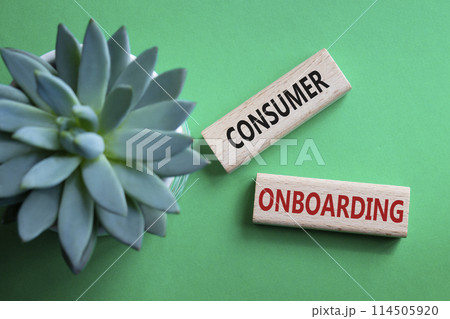 Consumer Onboarding symbol. Wooden blocks with words Consumer Onboarding. Beautiful green background with succulent plant. Business and Consumer Onboarding concept. Copy space. Consumer Onboarding symbol. Wooden blocks with words Consumer Onboarding. Beautiful green background with succulent plant. Business and Consumer Onboarding concept. Copy space. 114505920