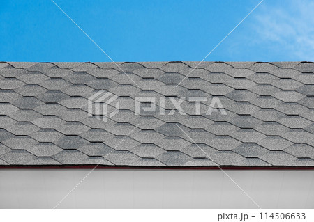 Grey mosaic tile roof house structure abstract building home pattern design object blue sky background 114506633