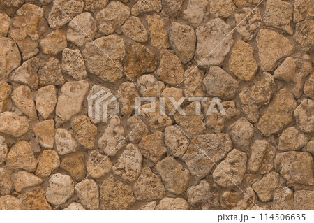 Brown rough stone floor wall abstract pattern mosaic texture background structure tile solid 114506635