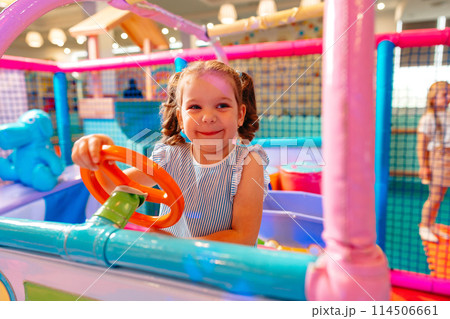 Little Girl Playing in Play Center 114506661