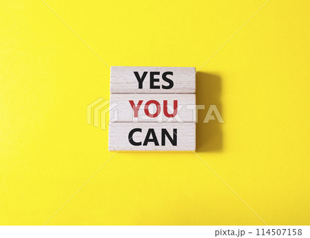Yes You Can symbol. Concept word Yes You Can on wooden blocks. Beautiful yellow background. Business and Yes You Can concept. Copy space. 114507158