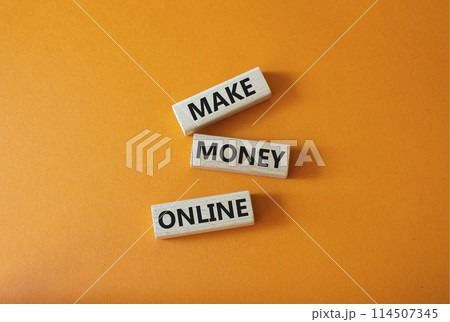 Make Money Online symbol. Concept words Make Money Online on wooden blocks. Beautiful orange background. Business and Make Money Online concept. Copy space. Make Money Online symbol. Concept words Make Money Online on wooden blocks. Beautiful orange background. Business and Make Money Online concept. Copy space. 114507345