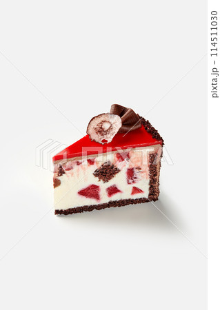 Slice of chocolate sponge cake with creamy cherry filling Slice of chocolate sponge cake with creamy cherry filling 114511030