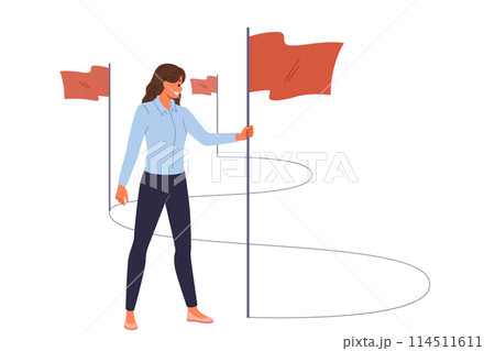 Business woman walks path to success and inserts winner flags on way to achieving professional goals 114511611
