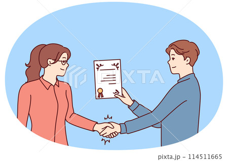 Boss gives certificate to woman for successful launch of project or increase in company profits. Boss gives certificate to woman for successful launch of project or increase in company profits. 114511665