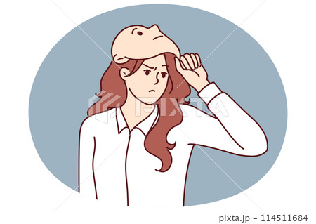 Frowning woman removes mask from face designed to hide identity or show fake emotions Frowning woman removes mask from face designed to hide identity or show fake emotions 114511684