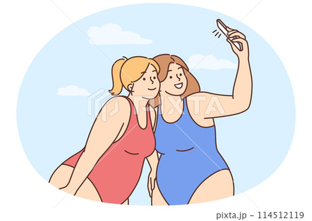 Overweight women in bikinis make selfie 114512119