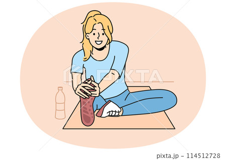 Smiling woman in sportswear training in gym Smiling woman in sportswear training in gym 114512728