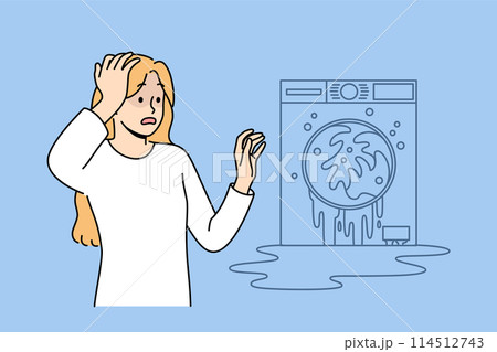 Broken washing machine shocks housewife who needs help of household appliance repairman Broken washing machine shocks housewife who needs help of household appliance repairman 114512743