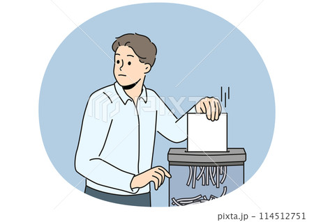 Businessman put document in shredder 114512751