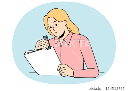 Female secretary stapling paperwork in office 114512765