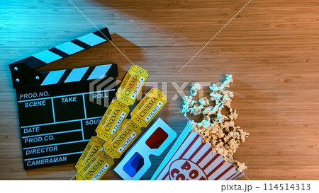 Cinema clapperboard, popcorn, tickets and 3d glasses Cinema clapperboard, popcorn, tickets and 3d glasses 114514313