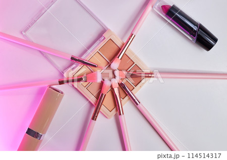 Background with decorative cosmetics on dressing table in makeup room 114514317