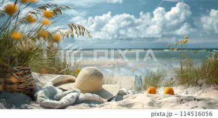 Summer Relaxation: Straw Hat and Book on Sandy Beach with Serene Ocean View 114516056