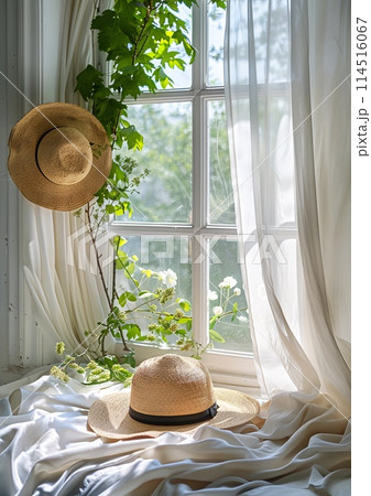 Straw Hat on White Drapery by Sunlit Window Inviting Summer Breeze 114516067