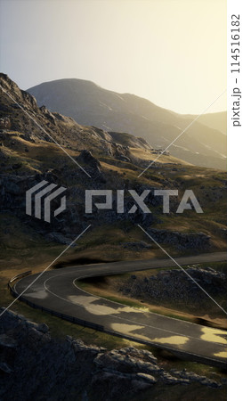 Twisting Road Through Scottish Mountain Range 114516182