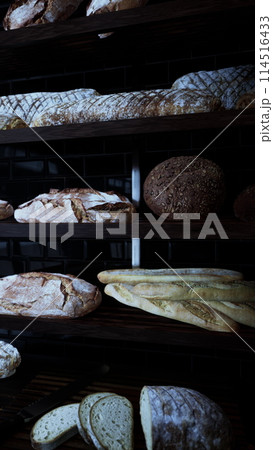Assorted Breads Displayed on Bakery Shelves Assorted Breads Displayed on Bakery Shelves 114516433