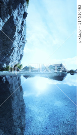Rocky Cliff Surrounding Body of Water 114516462