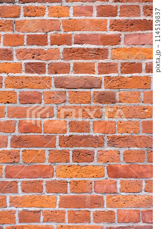 Empty brick red wall. background of a old brick house. 114519837