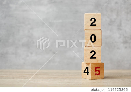 block flipping 2024 to 2025 text on table. Resolution, strategy, plan, goal, motivation, reboot, business and New Year holiday concepts block flipping 2024 to 2025 text on table. Resolution, strategy, plan, goal, motivation, reboot, business and New Year holiday concepts 114525866
