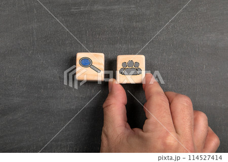 Labor Market. Wooden blocks on a dark chalkboard background Labor Market. Wooden blocks on a dark chalkboard background 114527414