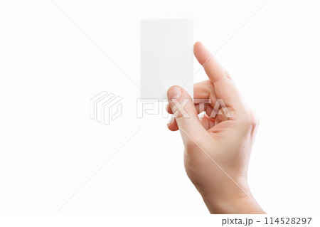 Male hand holding white business card at isolated background mockup. Male hand holding white business card at isolated background mockup. 114528297