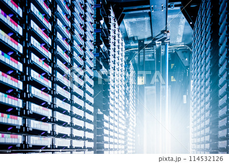 rows of data cloud hardware inside data center 114532126