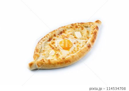 ajara Khachapuri with cheese, egg and butter, georgian kitchen isolated on white background top view ajara Khachapuri with cheese, egg and butter, georgian kitchen isolated on white background top view 114534708