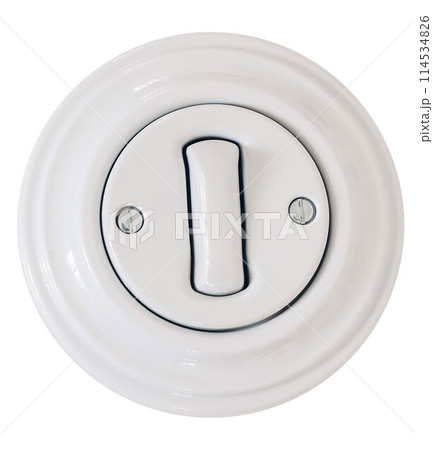 White round vintage porcelain switch. Cut out ceramic object isolated on transparent background. Interior decor. Electrical component. 114534826