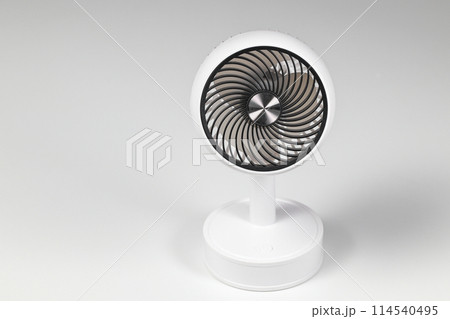 Small white plastic desktop fan side view, iSmall white plastic desktop fan side view, isolated on white background.solated on white background. Small white plastic desktop fan side view, iSmall white plastic desktop fan side view, isolated on white background.solated on white background. 114540495