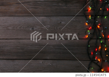 Christmas garland lights on grey background, copy space 114541473