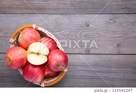 A red apples on a grey background 114542247