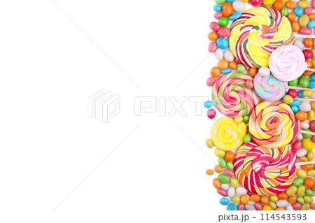 Colorful lollipops and different colored round candy isolated Colorful lollipops and different colored round candy isolated 114543593