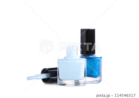 Blue nail polishes bottle isolated on white background Blue nail polishes bottle isolated on white background 114546317