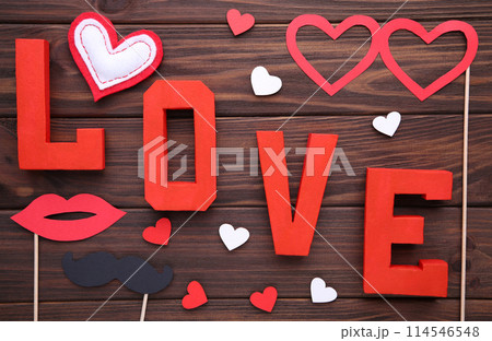 Valentine's day background with decoration on brown background. 114546548